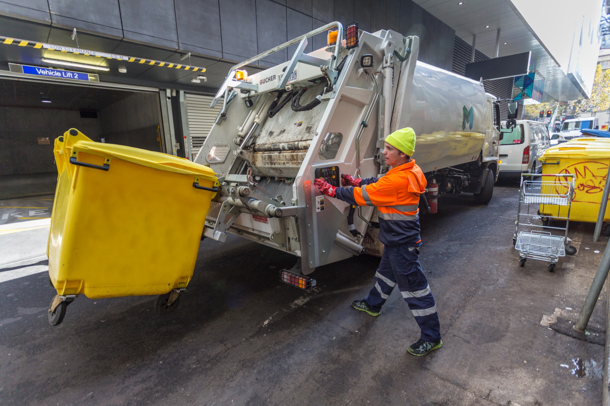 Person using waste truck 