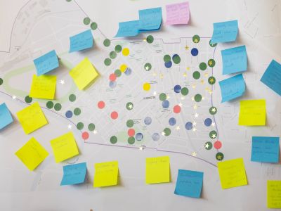 A map of Kensington with colourful stickers dots, post it notes and stars indicating where community members have made statements about their local urban forests.